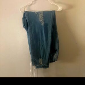 Plus size distressed stretch jeans